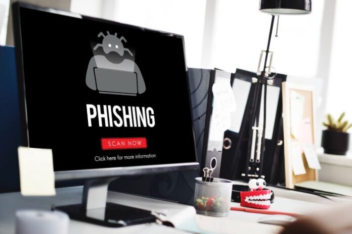 desktop monitor displaying the word phishing