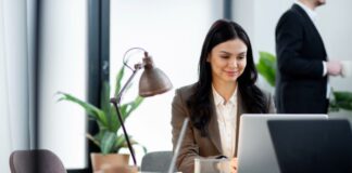 How To Improve The Efficiency Of Your Business Operations young business woman working to improve her business operations