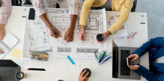 Picking the Best Project Management Software project managers working during a project management meeting