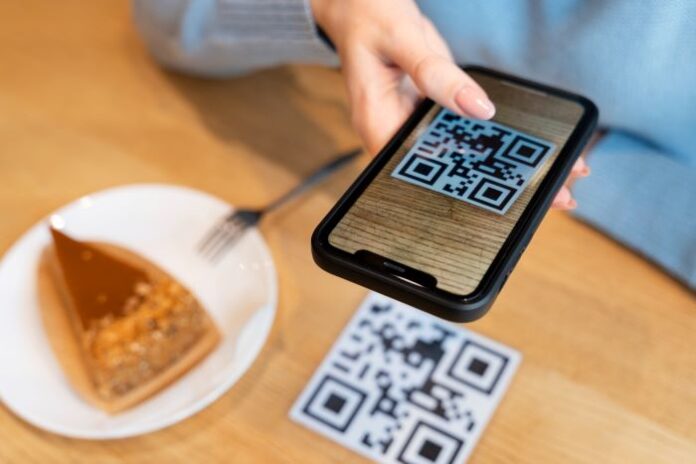 girl using QR codes in the retail trade