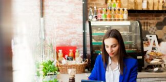 Are You Doing What You Can to Make Managing Your Small Business Easier? woman working on a tablet in her small business