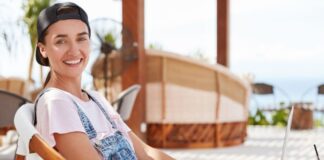 5 Non-Obvious Ways To Stay Safe On Your Upcoming Vacation girl on laptop staying safe during Vacation