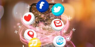 Tips On How to Be Safe on Social Media Being safe on social media with a hand holding a smartphone with social media graphics floating above.