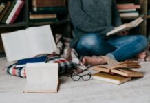 Mastering Time Management: Balancing Academic and Personal Life Books and glasses near reading student who is mastering time management