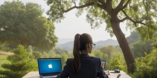 Optimizing Cybersecurity in a Remote Work Environment A remote worker outside at a desk, optimizing cybersecurity