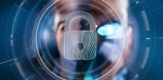 Understanding Identity Verification Solutions: A Comprehensive GuideĀ view through a magnifying glass of a person, with a lock graphic, showing identification verification