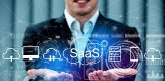 Rise of SaaS Development Services: Revolutionizing Business Solutions A man revolutionizing business showing graphic of Saas