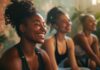 How Technology is Transforming Health and Wellbeing for Remote Workers Women in a yoga class transforming health and wellbeing