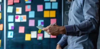 Penetration Testing Methodology and Reporting Man in office organizing his penetration testing methodology