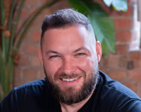 Dan Thomson Podcast Transcript Headshot of Founder Dan Thomson