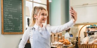 Epic Ways Your Small Business Can Start Making Megabucks young woman small business owner taking a selfie