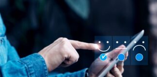 What is a Single Customer View? man on table looking at a single customer view