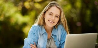 Maximize the Benefits of an Online MBA Program for Career Advancement college girl working on a laptop for her online MBA