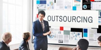 Boost Your Business Growth with Specialized Outsourcing Services Business team strategizing about specialized outsourcing