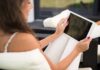 Tech Innovations That Are Changing the Way We Write Books woman using tech innovations on her tablet to write books