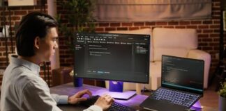 Tips For Using Web Development and UX For Your Website Programmer using web development skills and UX at a computer