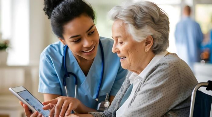 Developing an Efficient Caregiver Management System by Hutko.dev Caregiver and patient discussing Hutko management website