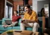 Key Features for a Seamless Tech Experience in Your New Place Roommates in their new home enjoying a seamless tech experience