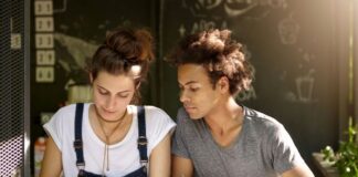 Is It Safe to Get Assignment Help Services in Australia? two friends studying who might get assignment help services