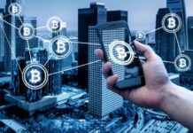 Coyyn.com Business: Is It A Future of Decentralized Finance? hand in front of cryptocurrency graphics using coyyn.com business