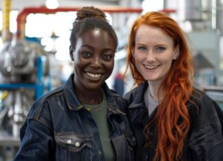 AI Tools Empower Female Entrepreneurs in Male-Dominated Industries Two female entrepreneurs in a male-dominated industry