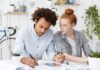 The Benefits of Long-Term Ghostwriting Partnerships Two businesspeople working together in a ghostwriting partnership