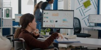 How to Avoid an ADA Website Compliance Lawsuit Before It’s Too Late ADA website compliance helping woman in wheelchair