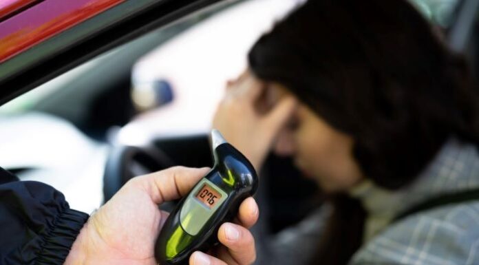 The Evolution of Breathalyzer Technology woman pulled over and given breathalyzer technology