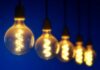 LowerEBill Simplifies Electricity Price Shopping with AI Platform row of lightbulbs to show electricity price shopping
