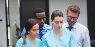 IRIS: The AI Solution Transforming Healthcare Operations medical team discussing healthcare operations over a digital tablet