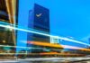 Key Leadership Skills for Thriving in Today’s Dynamic Business Landscape Light trails on road by business buildings, to illustrate leadership skills
