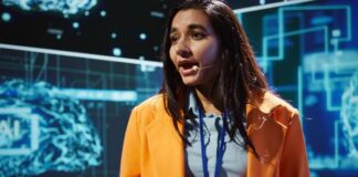 Hack-Proof Your Future with a Cybersecurity Degree woman talking to group about your future in cybersecurity