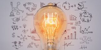 Redefining Entrepreneurship: Resilience, Differentiation, & Fulfillment a lightbulb with differentiation stats behind it