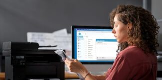 How to Fax a PDF Online: Quick and Easy Methods Woman using software to fax a PDF online