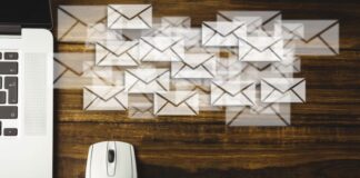 Personalizing Bulk Business Letters with Mail Merge wood desk with mail merge documents