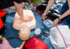 Using Tech to Aid in Emergencies: Modern First Aid and CPR students learning modern first aid and CPR
