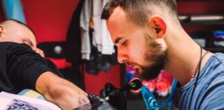 5 Innovative Technologies Revolutionizing the Tattoo Industry artist using laser in tattoo industry