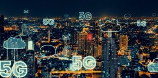 5G Technology and Its Impact on Business Networking city skyline at night with symbols and 5G technology icons over the horizon