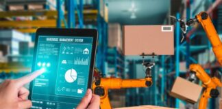 The Impact of AI on Logistics and Supply Chain Efficiency Warehouse and tablet showing impact of AI on logistics, with boxes