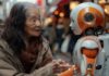 10 Best ChatGPT Alternatives in 2025 old woman looking at chatGPT alternatives, like a robot