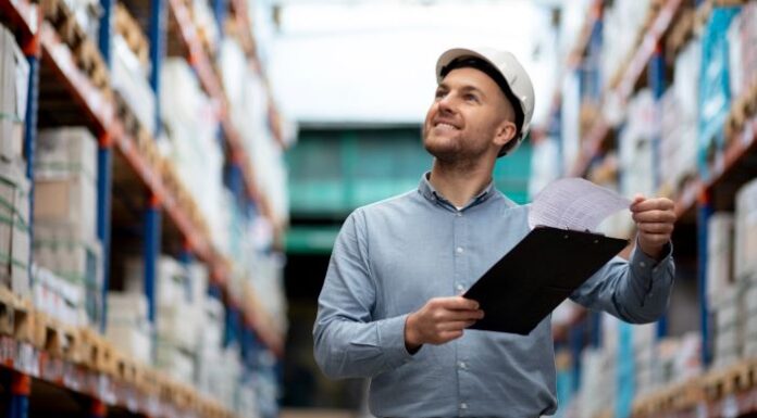 How Automated Inventory Management Systems Save Time and Money supervisor using automated inventory management in warehouse
