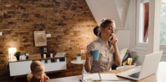 Mastering the Work from Home Paradigm woman with child adjusting to work at home paradigm