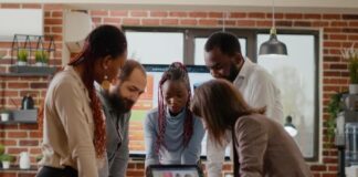 Is Data or Creativity More Important in Marketing? Ideas to Succeed team working on creativity important in marketing