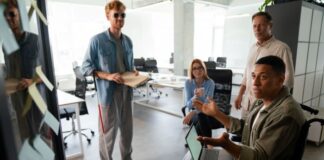 The Business Case for Accessibility: Why Inclusive Design Matters workers in office with inclusive design