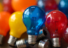 Romanian Intellectual Property Protection: Adapting to the Digital Era intellectual property in Romania represented by red, blue and yellow light bulbs