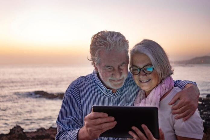 late-stage workers on beach planning retirement