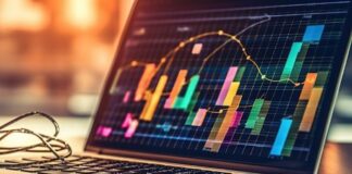 Looking to Predict Market Trends? How to Use AI to Figure Them Out laptop with bar graph to predict market trends