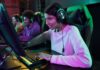 AI vs. Human: Can Artificial Intelligence Outplay Pro Gamers? group of pro gamers at a tournament