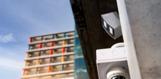 The Importance of Business Security Cameras security cameras mounted on the side of a high-rise building