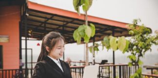 Boost Your Business Growth with Expert SEO Services in Thailand Woman working outside on SEO services in Thailand